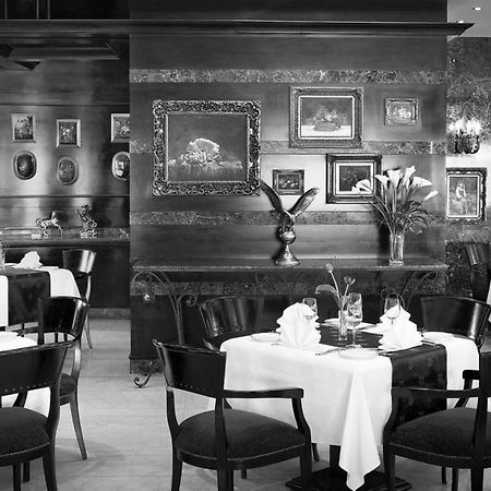 Al Sondos Suites By Le Meridien Dubai Restaurang bild